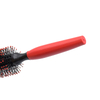 Woman Blow Drying Hair Brush