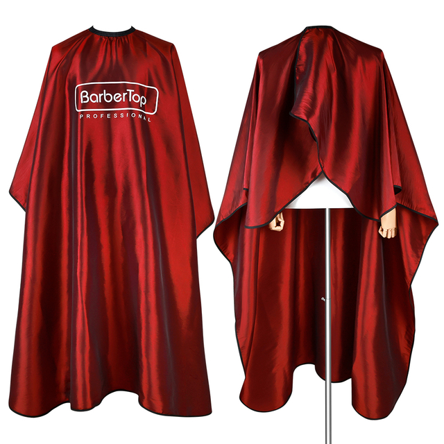Glossy red salon cape for professional hair coloring and styling