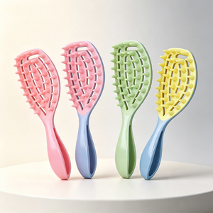 Hollow vented hair brush in pink, blue and green for fast drying